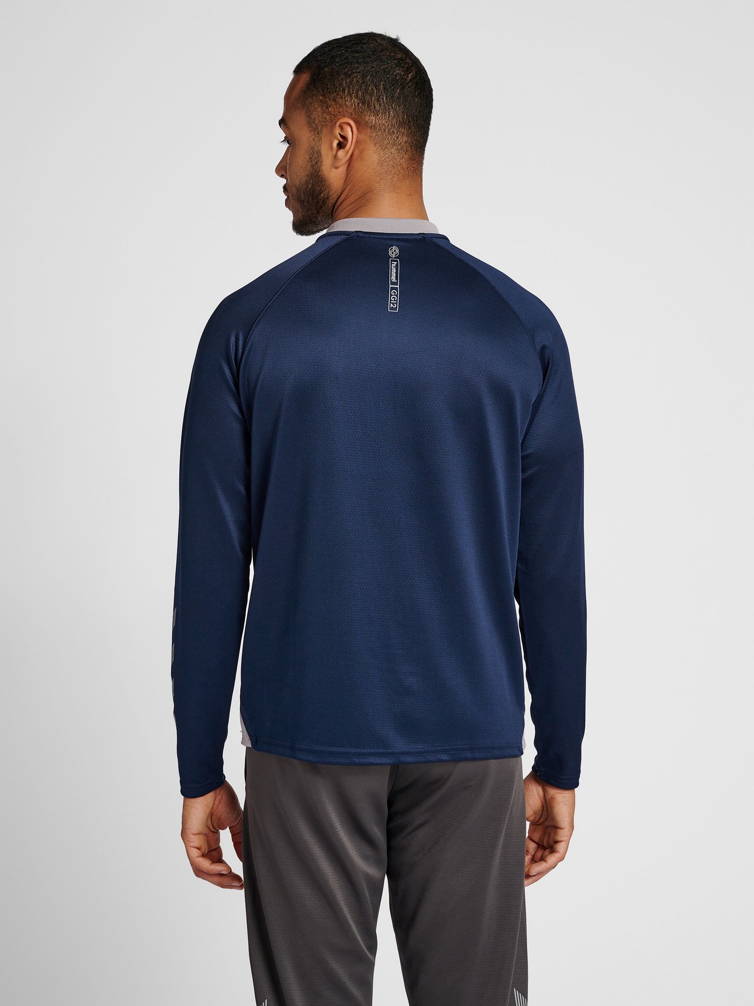 hmlGG12 ACTION HALF ZIP SWEAT