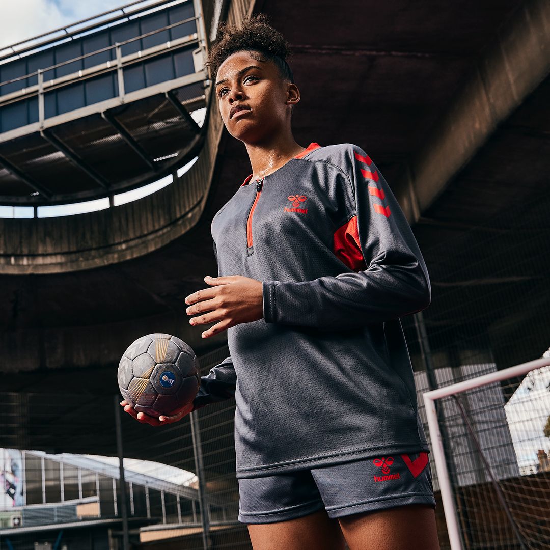 hmlACTION POLY HALF ZIP SWEAT WOMAN