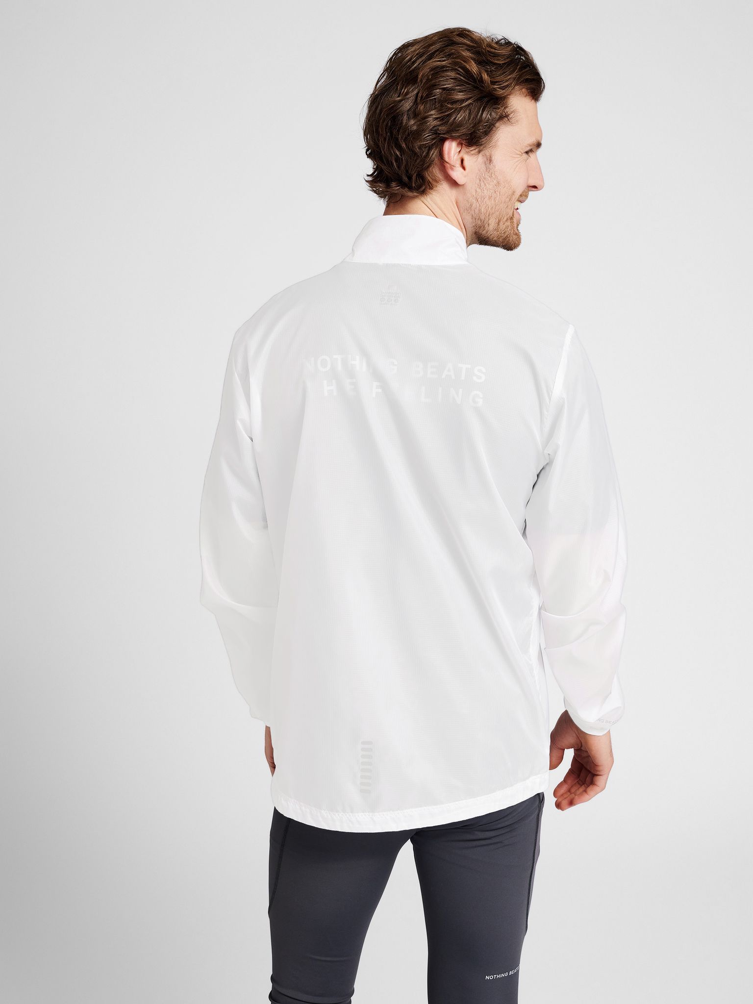 MEN PACKABLE TECH JACKET